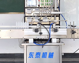 <b>6頭液體灌裝機+四輪搓蓋機</b>